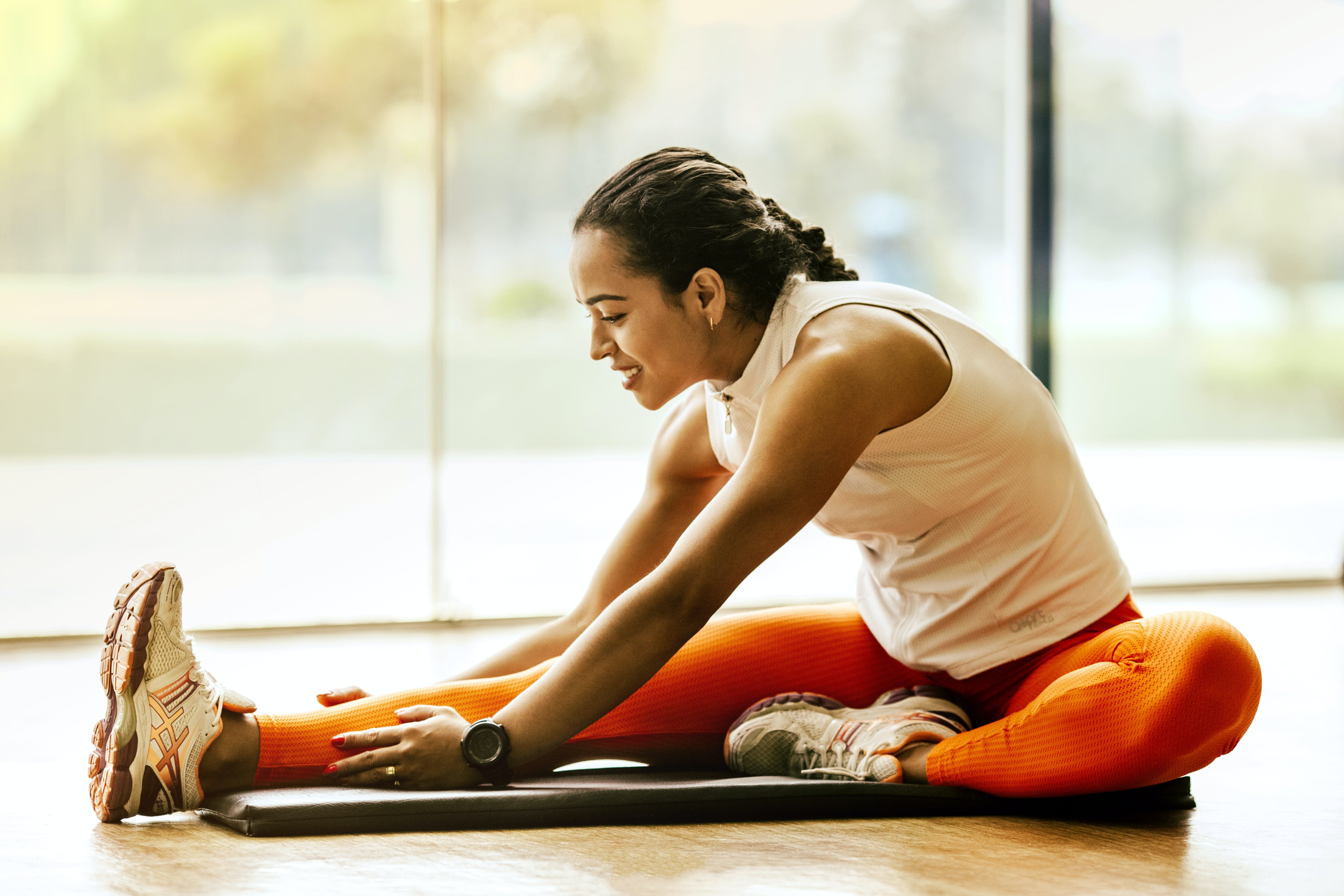 woman stretching legs