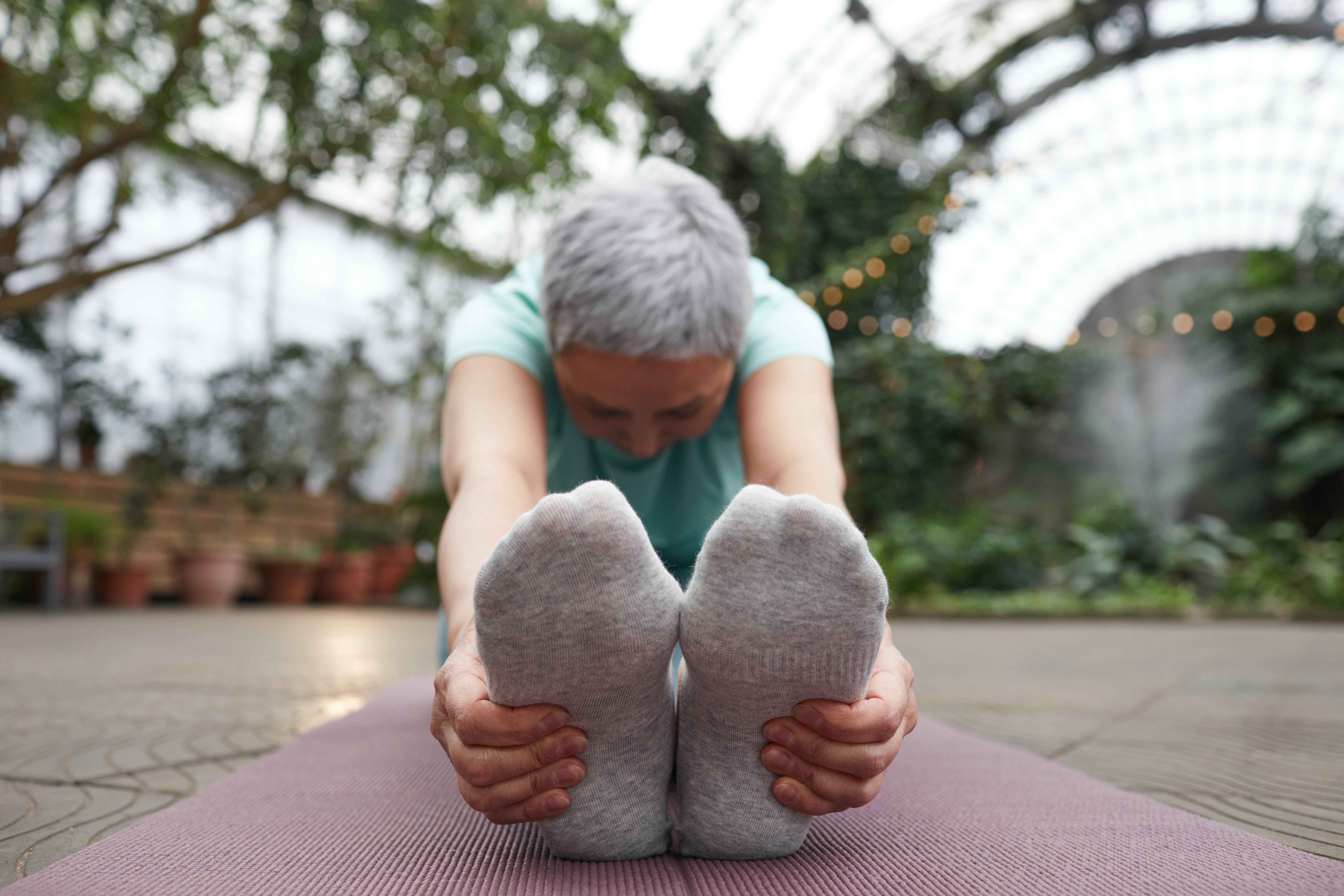 woman stretching feet