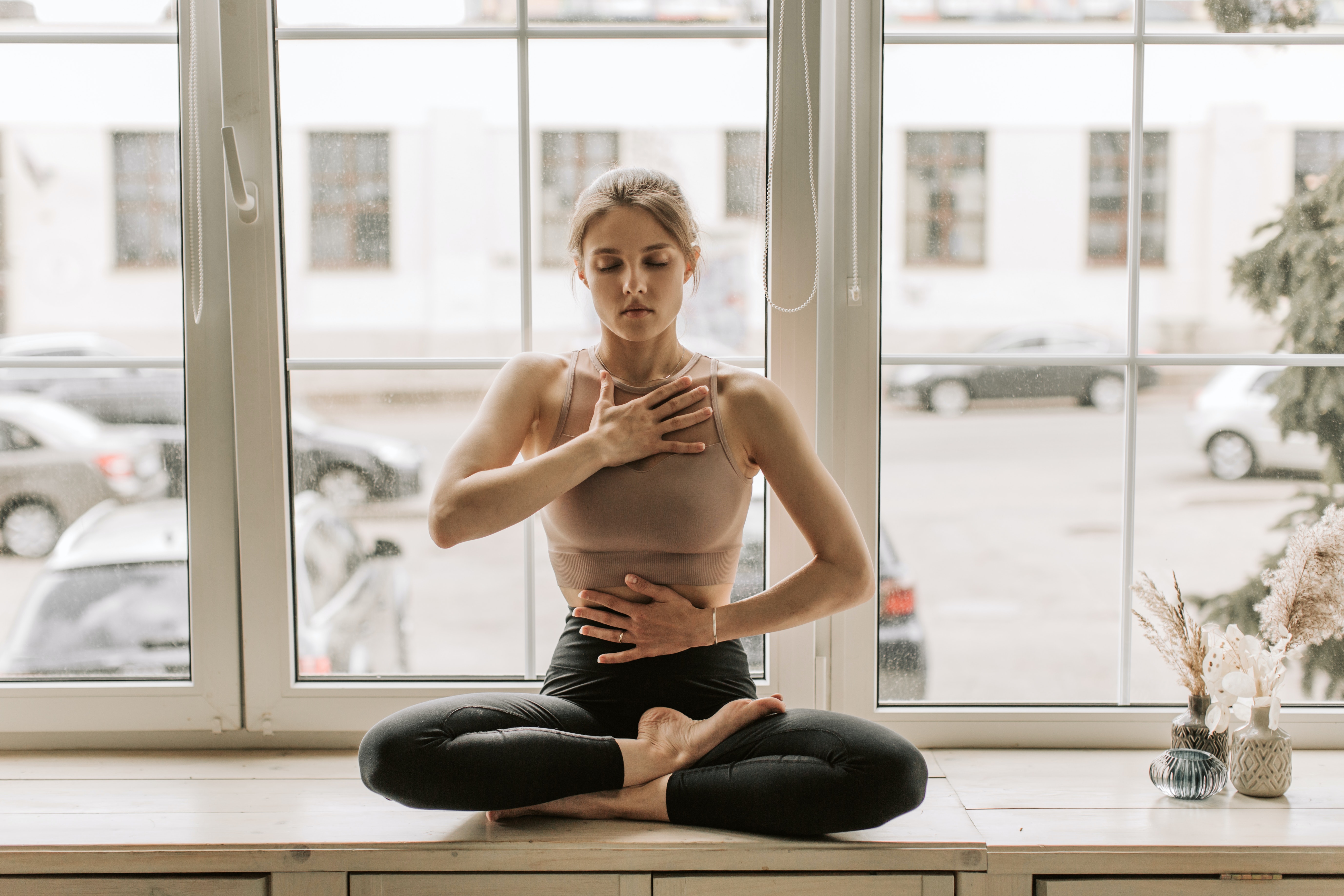 Woman Practicing Breathing Techniques